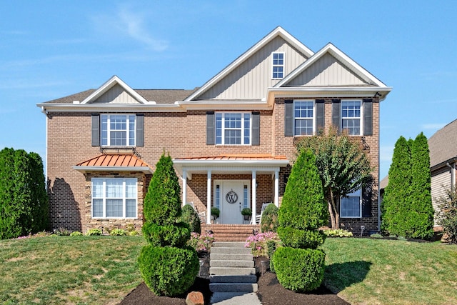 view of front of house with a front lawn