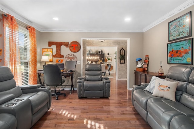 living room with ornamental molding and hardwood / wood-style flooring