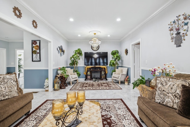 living room featuring ornamental molding and an inviting chandelier