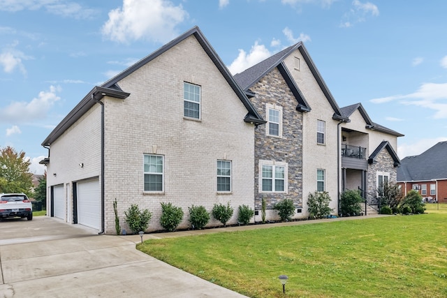 view of property exterior with a yard, a balcony, and a garage