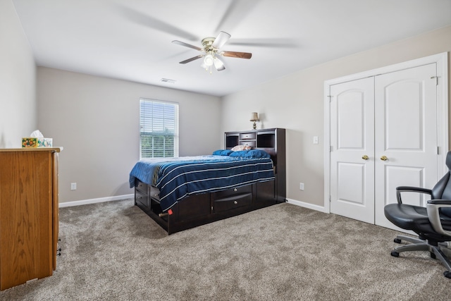 bedroom featuring a closet, ceiling fan, and carpet