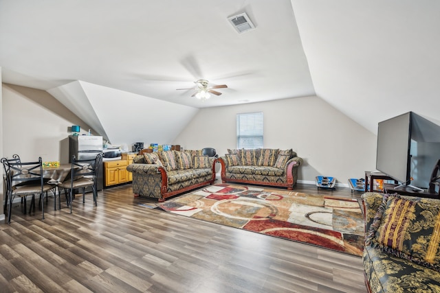 living room featuring vaulted ceiling, wood-type flooring, and ceiling fan