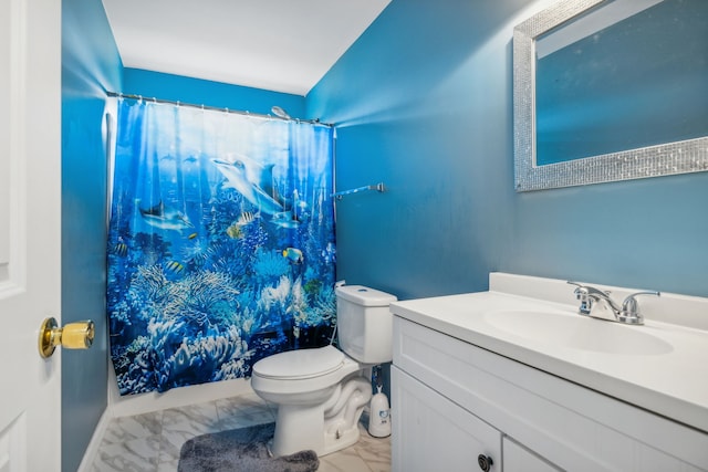 bathroom with toilet, vanity, and a shower with shower curtain