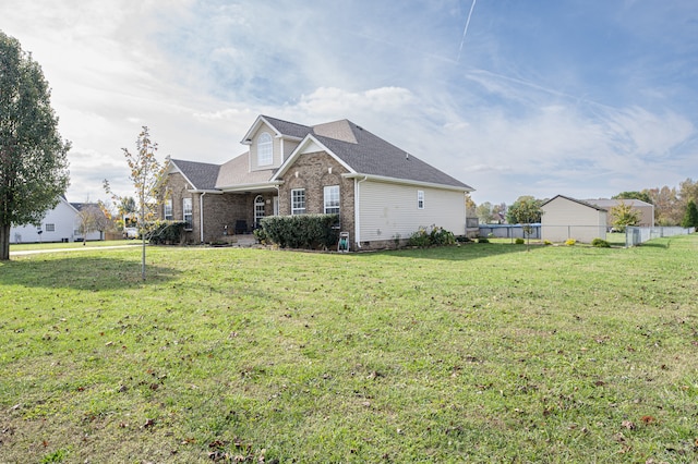 view of front of home with a front yard