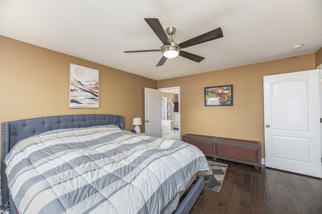 bedroom featuring dark hardwood / wood-style flooring and ceiling fan