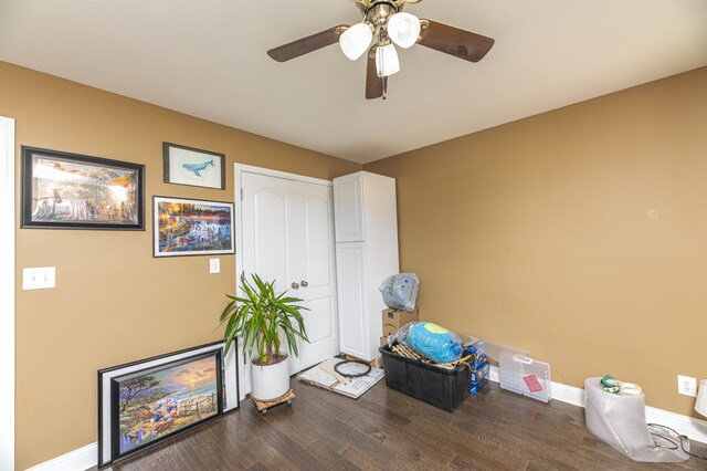 interior space with hardwood / wood-style flooring and ceiling fan