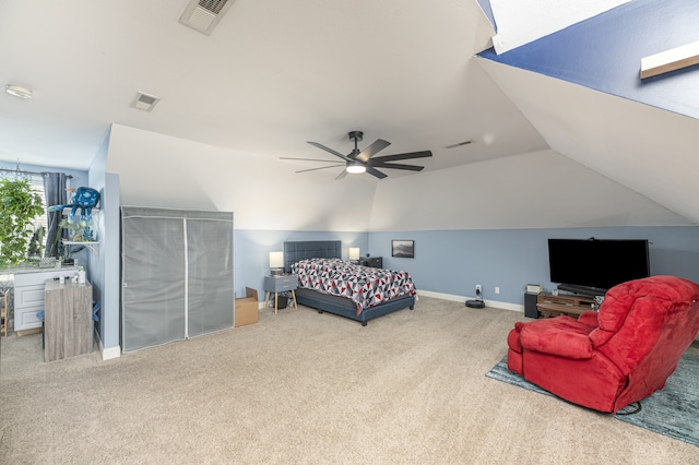 carpeted bedroom featuring ceiling fan and lofted ceiling