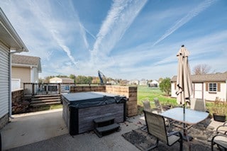 view of patio / terrace featuring a hot tub