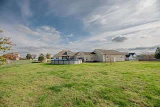 view of yard with a pool