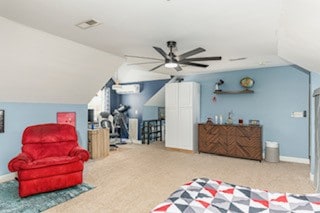 bedroom with lofted ceiling, carpet flooring, and ceiling fan