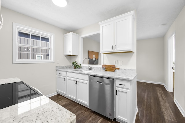 kitchen with sink, dishwasher, and white cabinetry