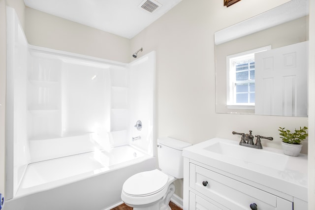 full bathroom featuring vanity, shower / bathing tub combination, and toilet