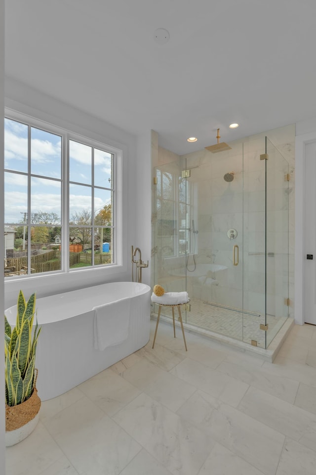 bathroom with independent shower and bath