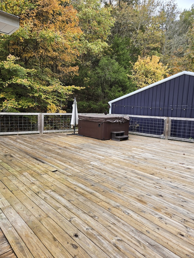 deck with a hot tub