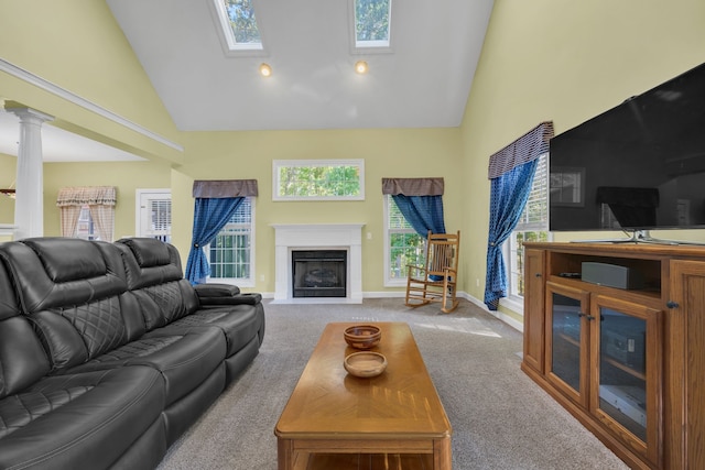 carpeted living room featuring high vaulted ceiling