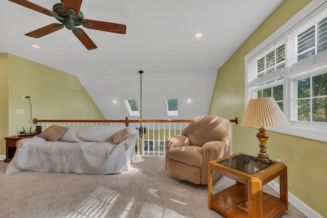 interior space featuring ceiling fan and vaulted ceiling