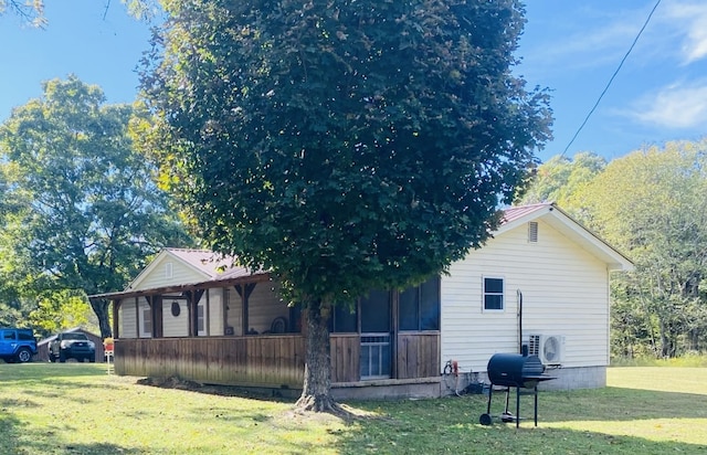 view of home's exterior featuring a lawn