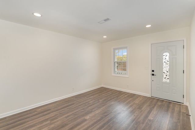 entryway with dark hardwood / wood-style floors