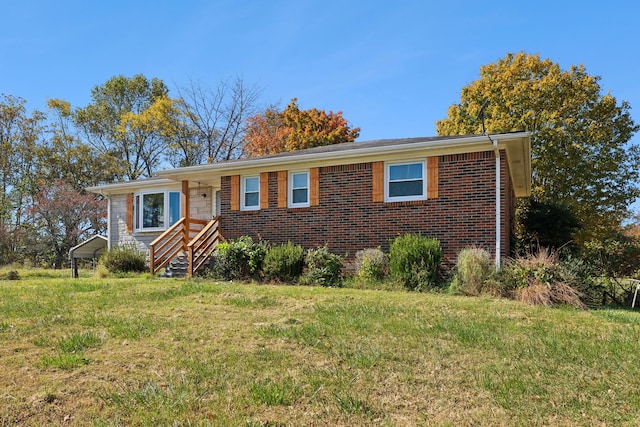 ranch-style house featuring a front lawn