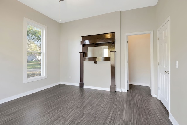 spare room featuring dark hardwood / wood-style floors