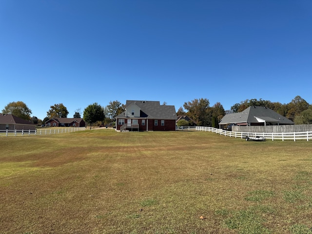 view of yard featuring a rural view