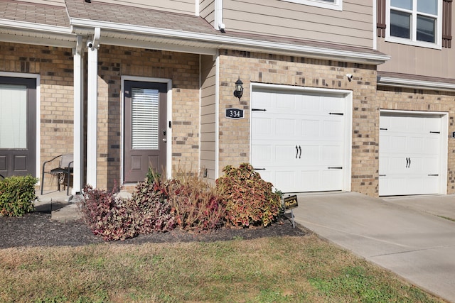 property entrance with a garage