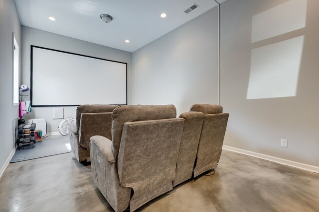 home theater with concrete floors