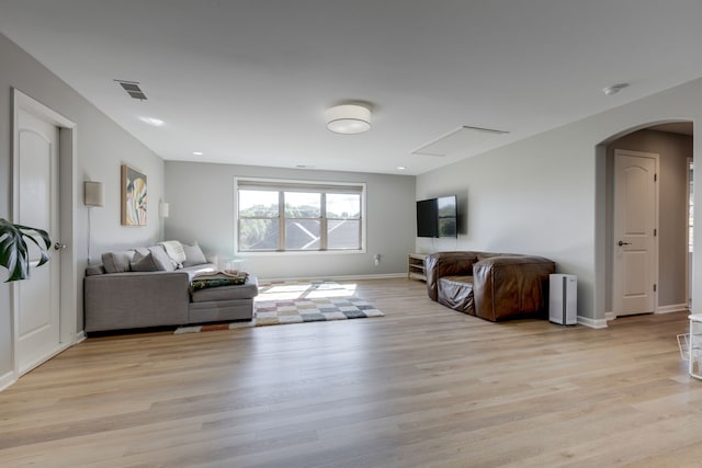 living room with light hardwood / wood-style floors