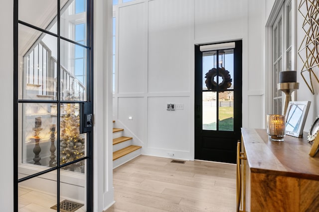 entrance foyer featuring light hardwood / wood-style flooring