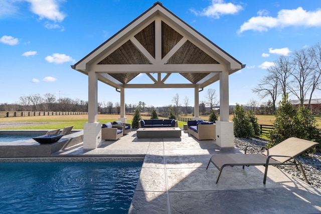 view of pool with a gazebo, outdoor lounge area, and a patio