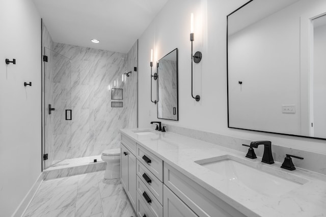 bathroom featuring vanity, toilet, and walk in shower