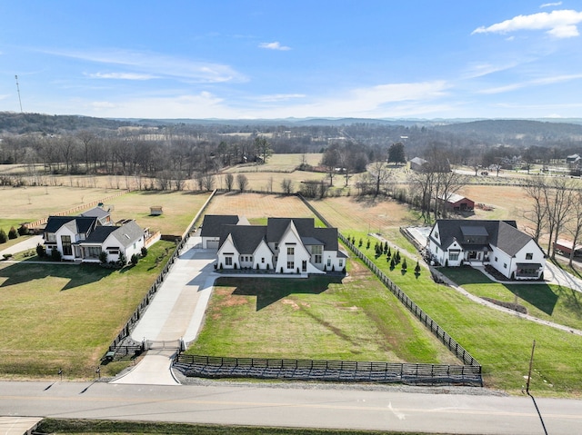 bird's eye view with a rural view and a mountain view