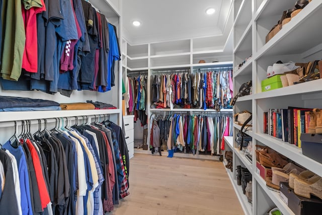 walk in closet featuring light hardwood / wood-style floors