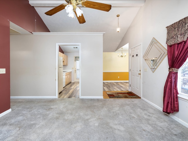 unfurnished room featuring beam ceiling, carpet flooring, and ceiling fan