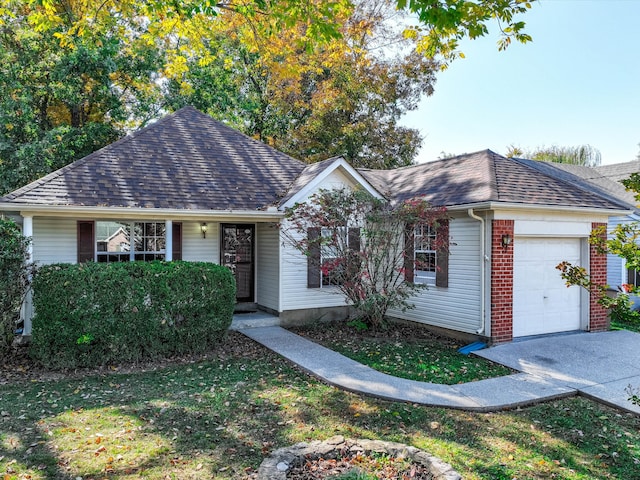 ranch-style home featuring a garage and a front lawn