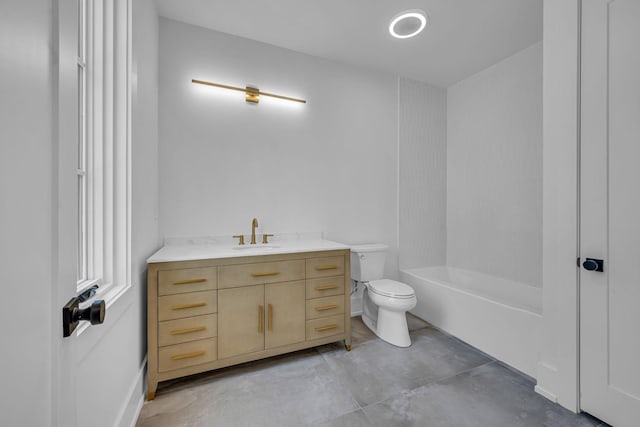 full bathroom featuring vanity,  shower combination, and toilet