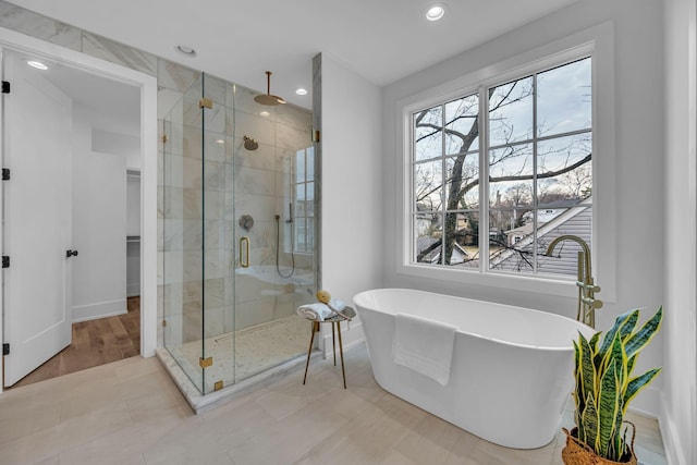 bathroom with independent shower and bath