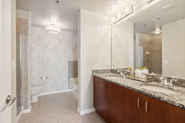 full bathroom with vanity, toilet, tile patterned floors, and separate shower and tub