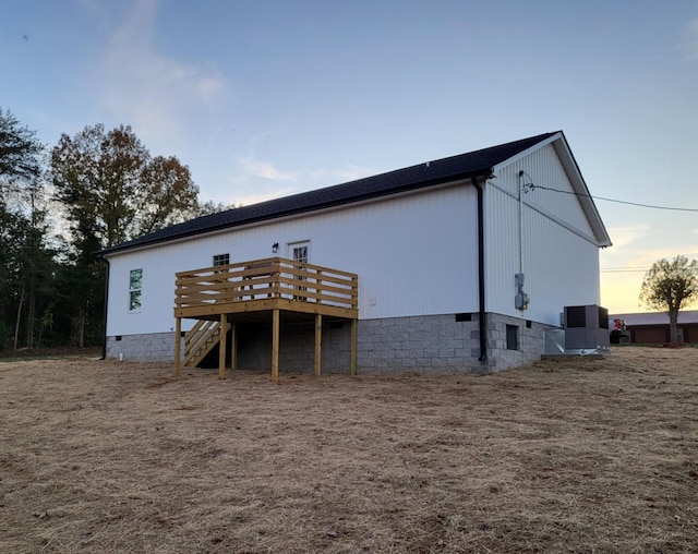 view of outdoor structure at dusk