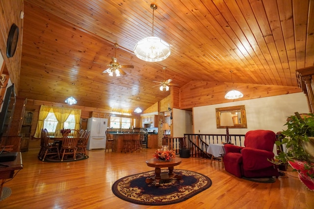 living room with ceiling fan, high vaulted ceiling, wooden ceiling, and hardwood / wood-style floors