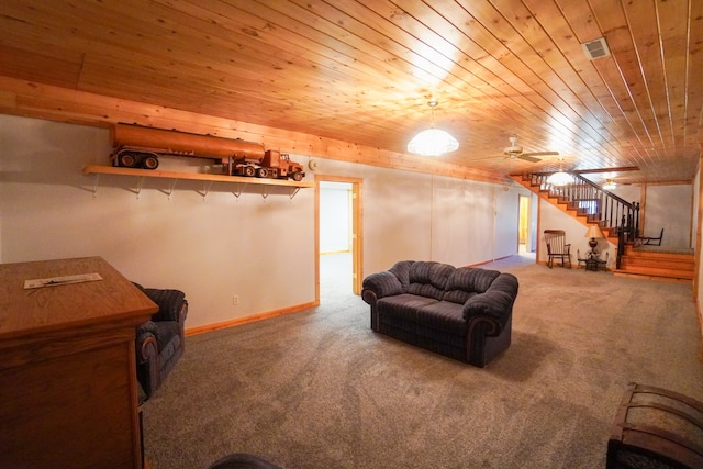 living room with wood ceiling, carpet flooring, and ceiling fan