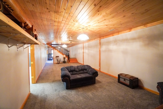 basement featuring wood ceiling and carpet flooring