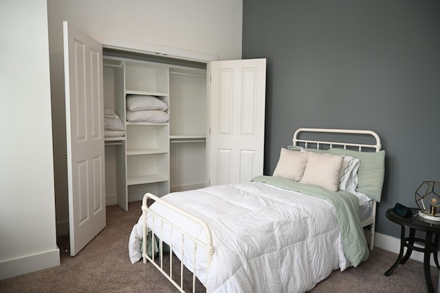 carpeted bedroom featuring a closet