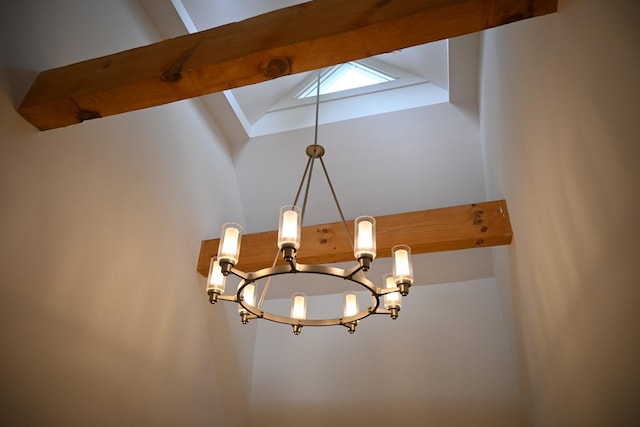 interior details featuring a chandelier