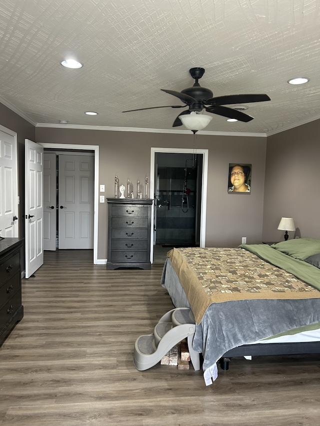 bedroom featuring ornamental molding, dark hardwood / wood-style floors, and ceiling fan