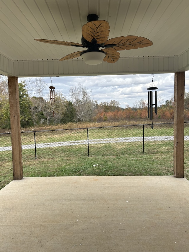 exterior space featuring ceiling fan