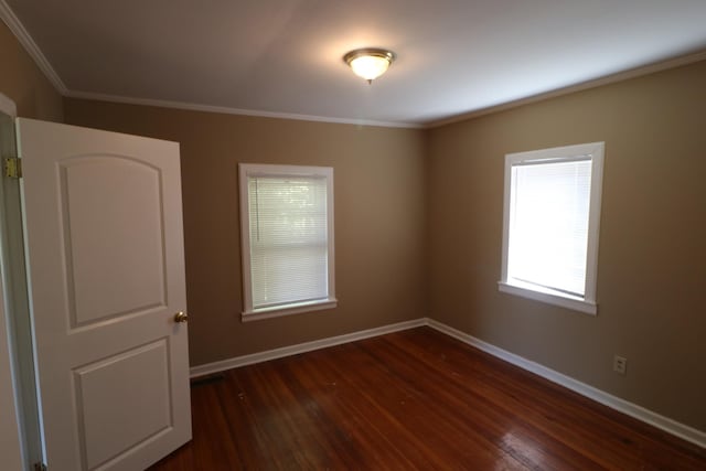 304 Mitchell St, Clarksville, TN 37042 - empty room with baseboards, dark wood-style flooring, and ornamental molding