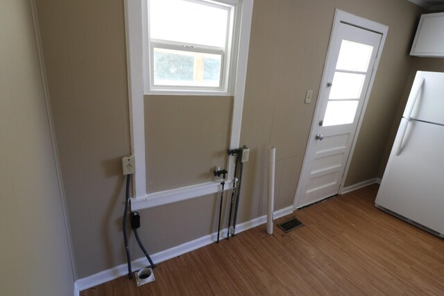 304 Mitchell St, Clarksville, TN 37042 - doorway to outside featuring light wood-type flooring, visible vents, and baseboards