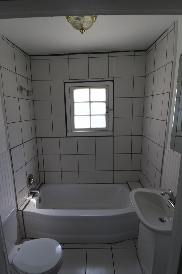 304 Mitchell St, Clarksville, TN 37042 - full bathroom with shower / bathing tub combination, toilet, a sink, and tile patterned floors