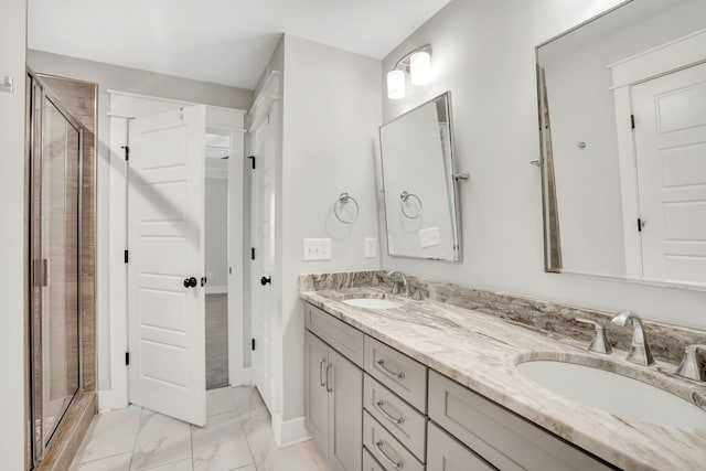 bathroom featuring vanity and walk in shower